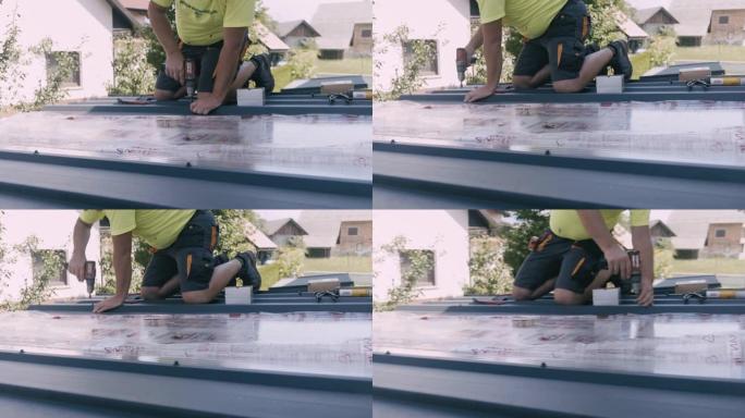 建筑承包商正在安装金属屋顶板