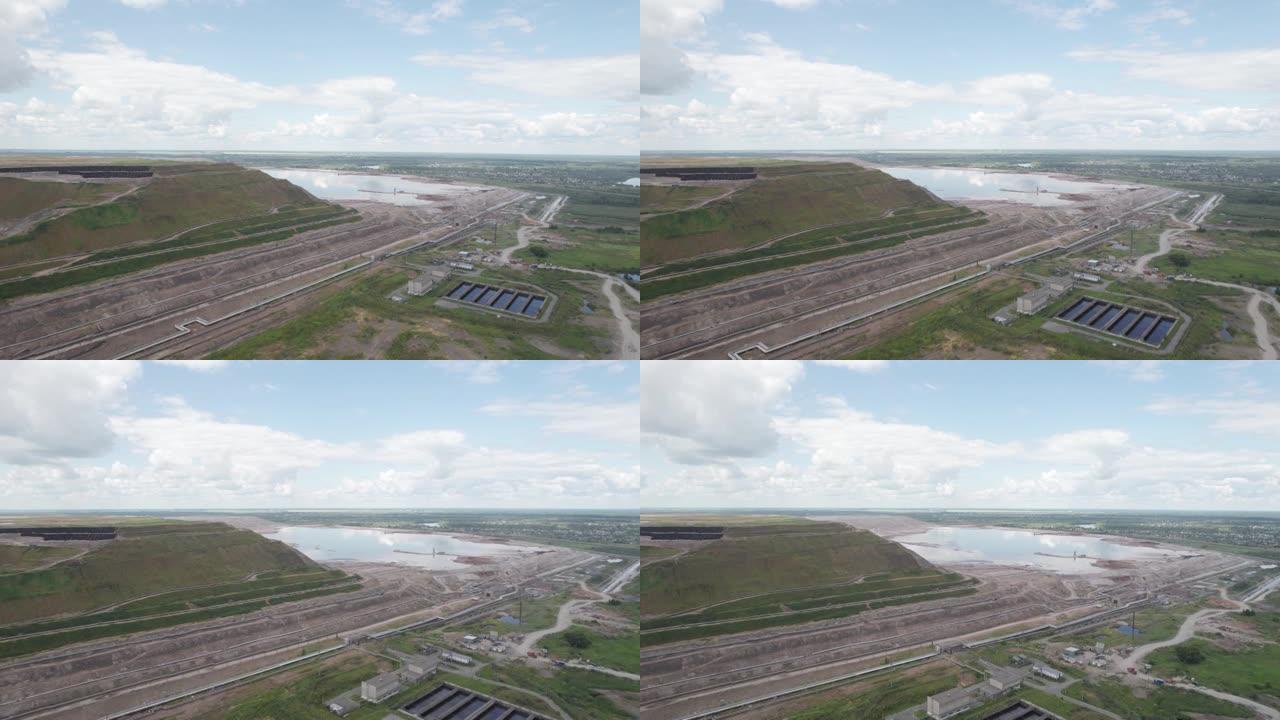 工业用地环境污染-工厂污染物排放氧化铝工厂的鸟瞰图。