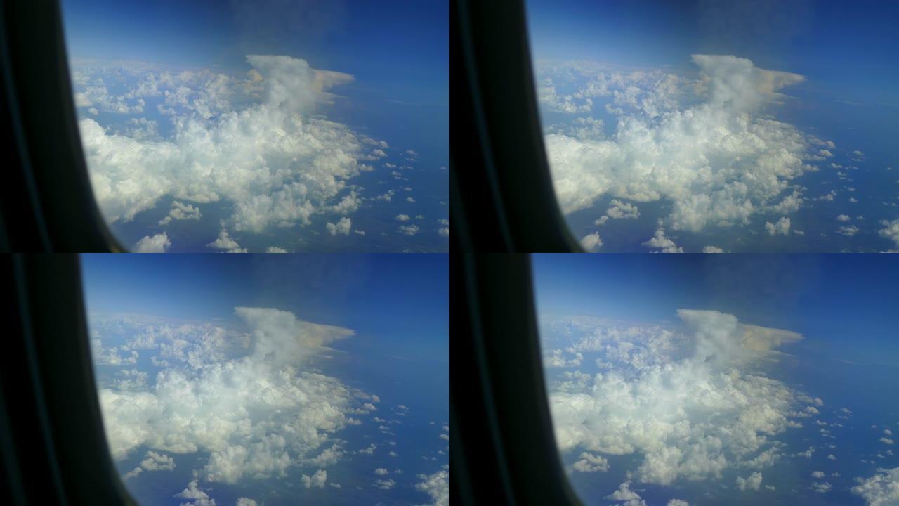 从云层看山脉 -- 透过飞机窗户