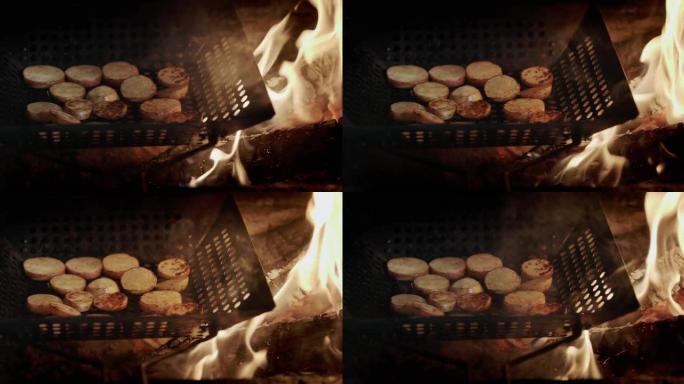 将土豆片在烤架的煎锅中油炸，在煎锅火焰和热煤旁边