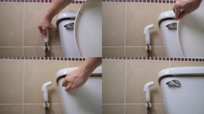 用手将洒水器放在手柄上，然后关闭马桶盖，并在使用完成后冲洗水以进行清洁
