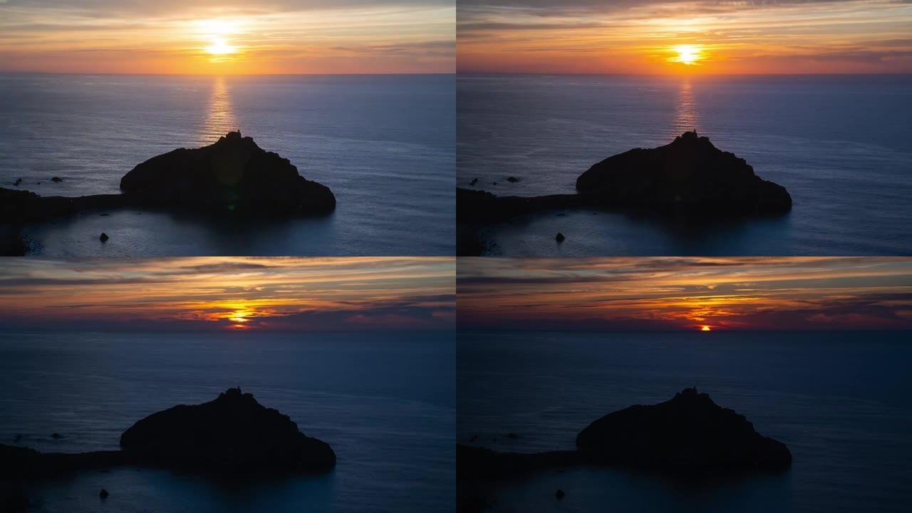 西班牙巴斯克地区圣胡安·德·加兹卢加特的延时日落。被大海包围的西班牙岛屿非常著名和旅游。4k视频。西