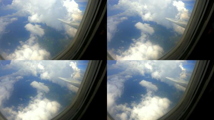 美丽蓬松的云-透过飞机窗户看