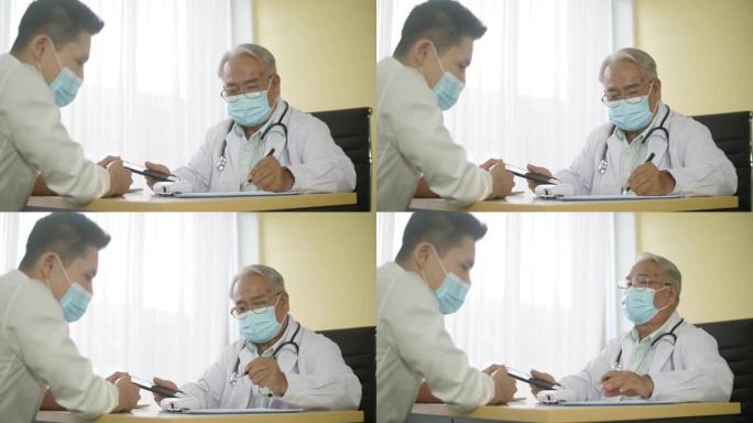 亚洲患者向医生咨询他的症状