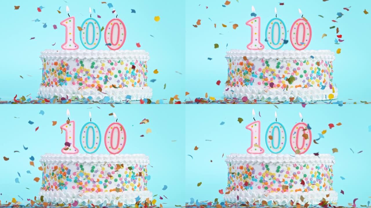 生日蛋糕与燃烧五颜六色的蜡烛与数字100