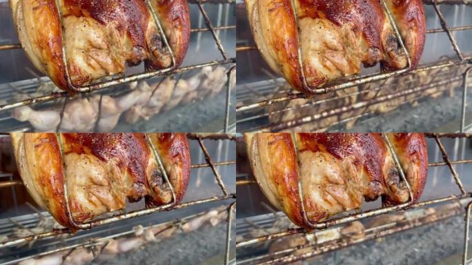 特写鸡肉在木炭烤架上烤。