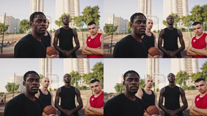黑人篮球运动员和他志同道合的朋友的特写肖像。篮球队在篮球场训练前