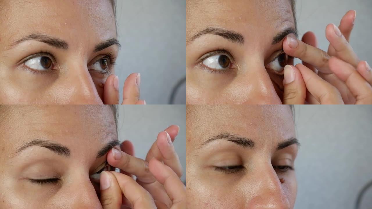 黑发女人拿着手指在眼睛上戴隐形眼镜。治疗眼部疾病，如近视或近视、散光或美容镜片。视力的改善和矫正。