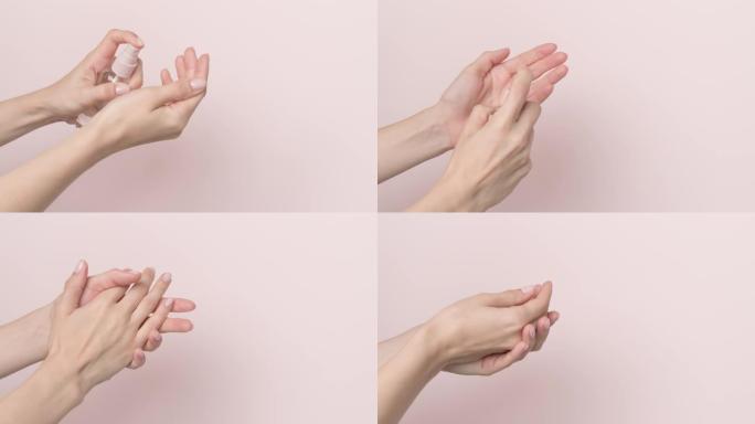 浅粉色背景上使用洗手液喷雾分配器的女性手-停止运动动画