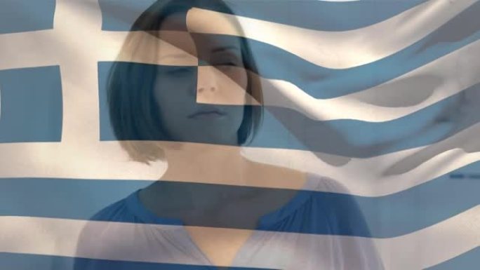 希腊国旗的数字组成在医院挥舞着紧张的高加索妇女