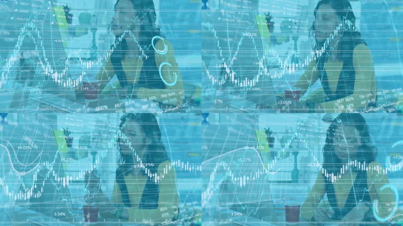 亚洲妇女在办公室工作时使用计算机的股票市场和金融数据处理