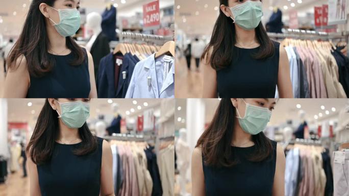 亚洲泰国/中国白领戴口罩享受打折购物商场去百货公司享受季末大甩卖下班后特价