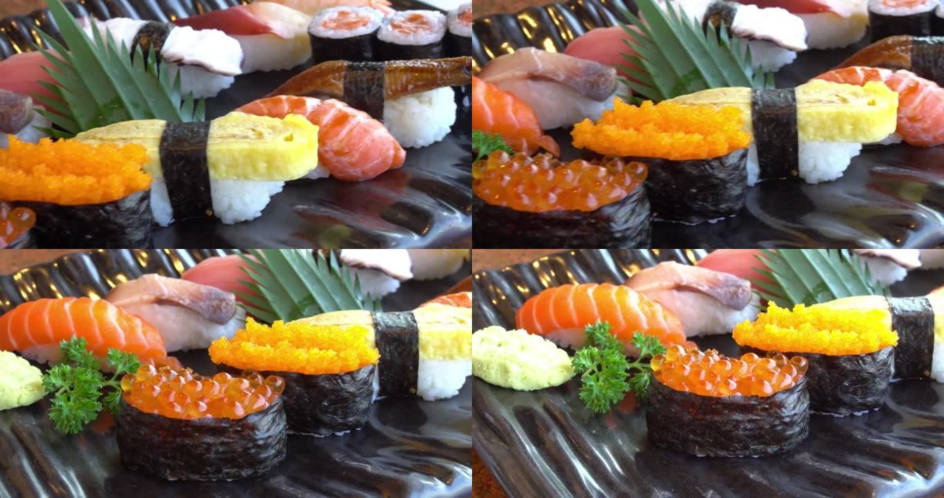 寿司卷套装三文鱼和金枪鱼日本食物旅行烹饪概念视频广告演示4k