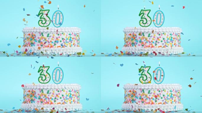 30号燃烧五颜六色蜡烛的生日蛋糕