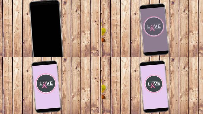 动画粉红乳腺癌丝带标志与爱的文字在智能手机屏幕