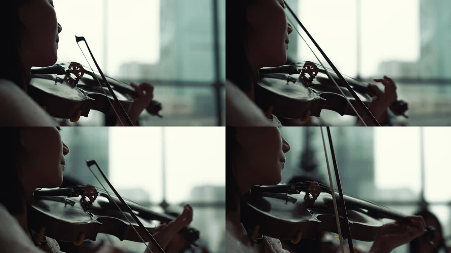 拉小提琴剪影