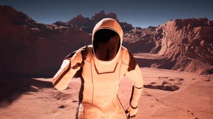 宇航员很高兴能在火星上，并竖起大拇指。宇航员火星殖民和探索火星。该动画是为未来派，科幻或太空旅行而设