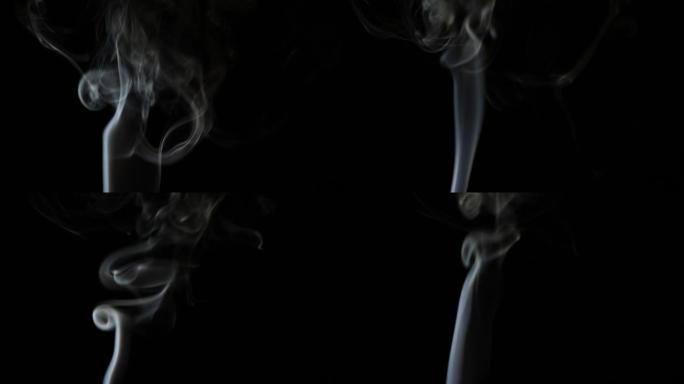 黑暗背景上一束光中的烟雾的美丽运动