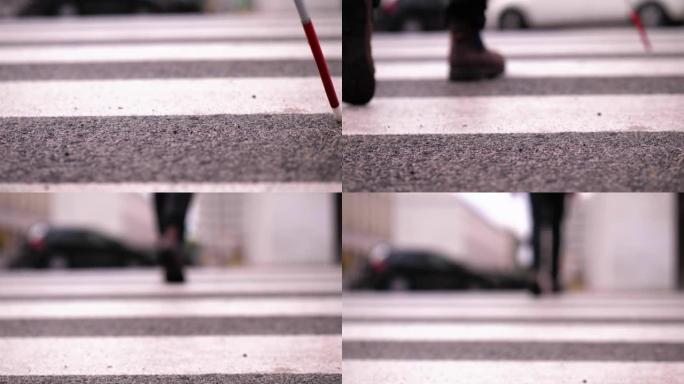 失明，自治-盲人用拐杖穿过马路接触地面