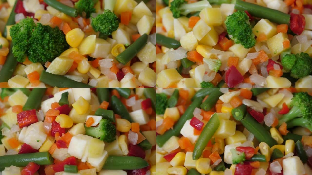 新鲜混合蔬菜青豆玉米西兰花红辣椒胡萝卜特写。宏观拍摄混合蔬菜背景。特写健康清洁饮食，有机节食素食素食