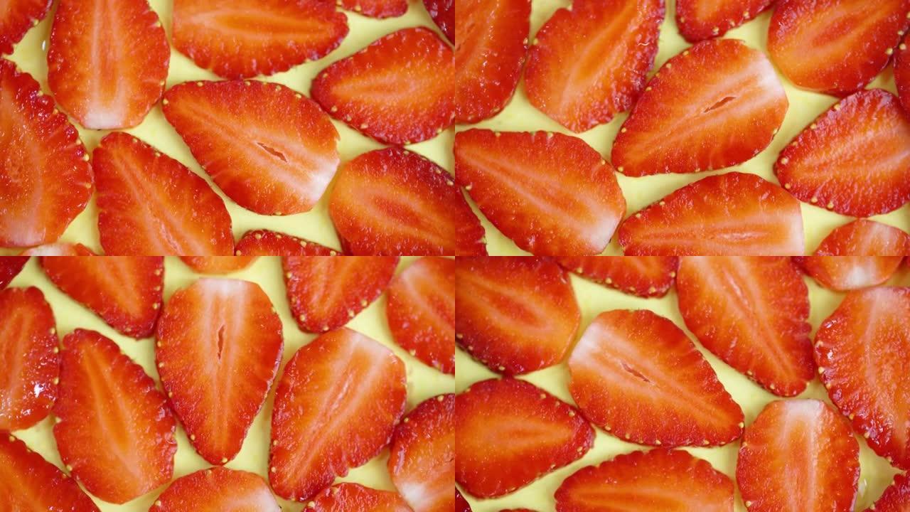 新鲜的草莓切片在桌子上旋转