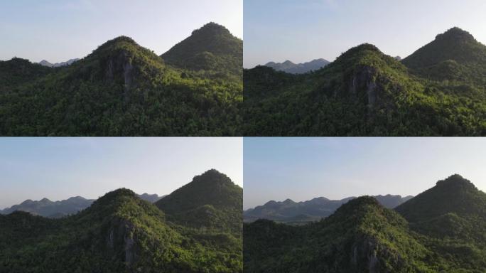 日落时飞越绿色自然，空中射击