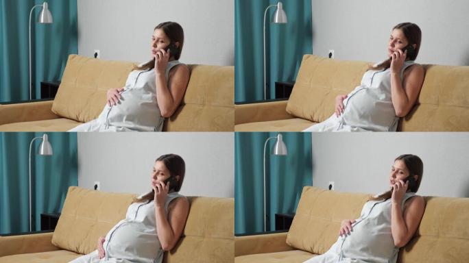 孕妇坐在沙发上打电话时会宫缩