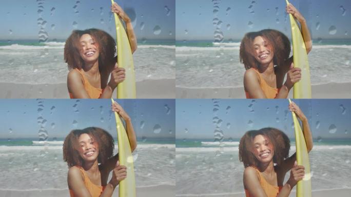 海滩上微笑的非洲裔美国妇女的水滴动画，冲浪板在海上