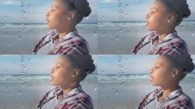 非裔美国妇女在沙滩上飞沫上放松的动画