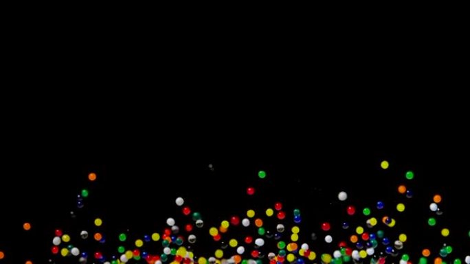明亮的彩色水凝胶球在黑色背景下弹跳。聚合物凝胶。硅胶。由声音振动引起的水凝胶球在不同的方向上弹跳和飞