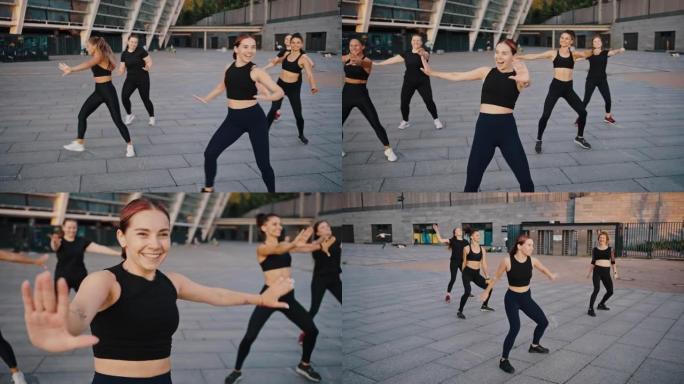 多元化的女性团体开设了户外运动舞蹈课程。不同年龄和肤色的女孩进行拉丁舞训练