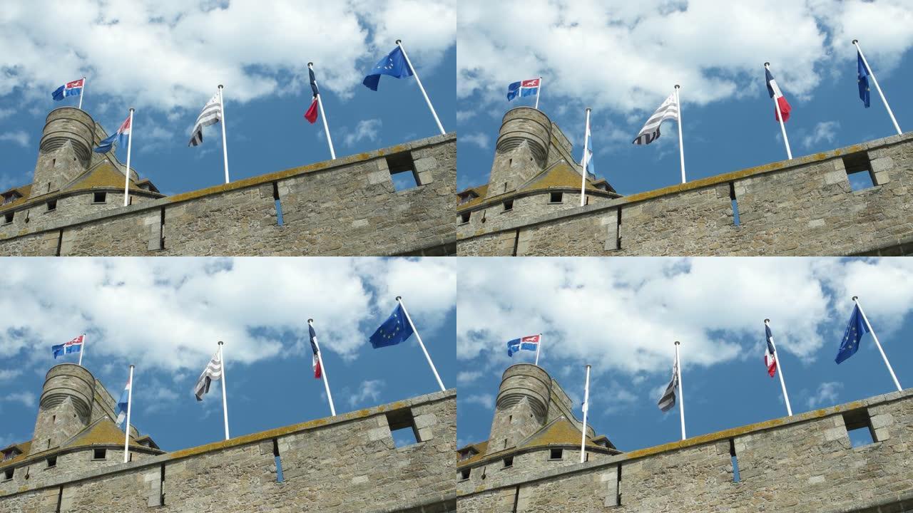 城墙上的旗帜在旗杆上迎风飘扬