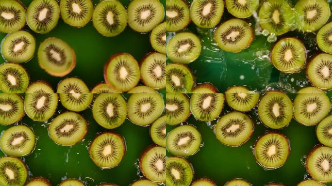 猕猴桃切片以慢动作溅入水或猕猴桃汁中。美味的绿色夏季水果。