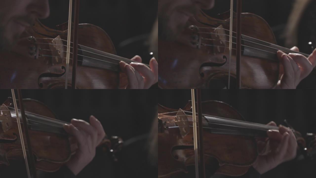弦乐四重奏在黑暗的大厅里演奏古典交响曲