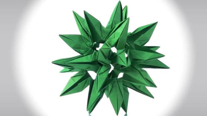 绿色抽象宇宙折纸物体。
