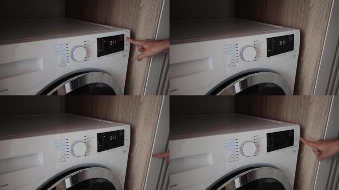 打开房子里的洗衣机。