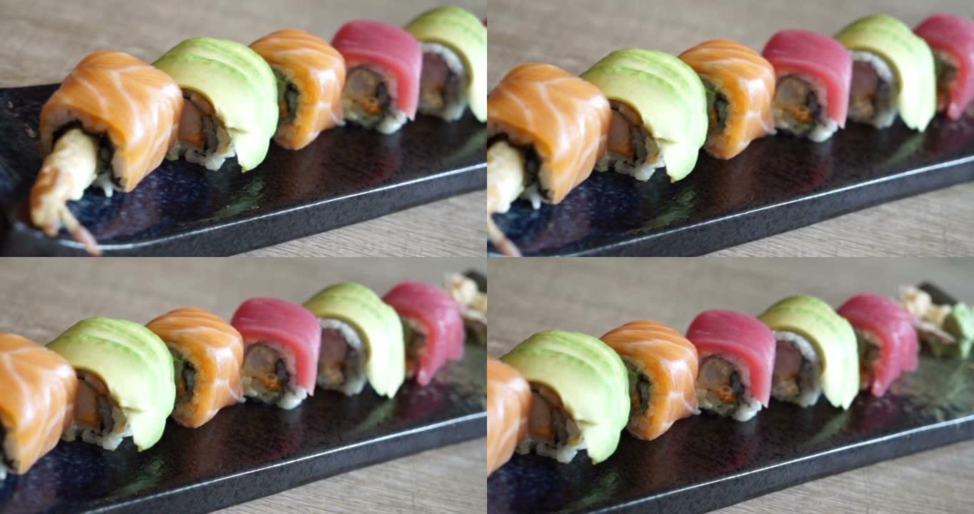 亚洲菜亚洲日本料理餐多种寿司排成一排。自制传统食品旅行烹饪