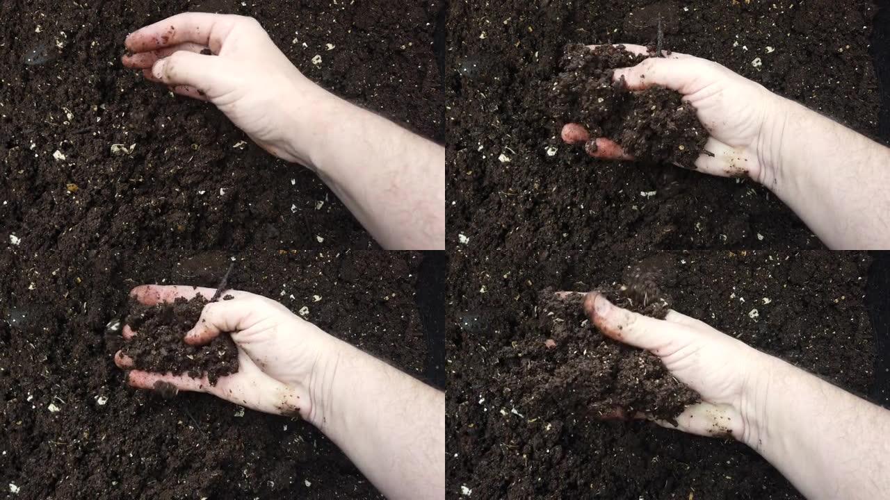 腐殖质，施肥土壤，堆肥土壤。人手握堆肥，有机土壤，天然肥料。农业和生育概念