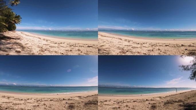 标题: 在绿松石色泻湖的放松在空旷的海滩上的水平旋转视图在阳光明媚的日子里仰望大海，蓝天阳光的椰子树