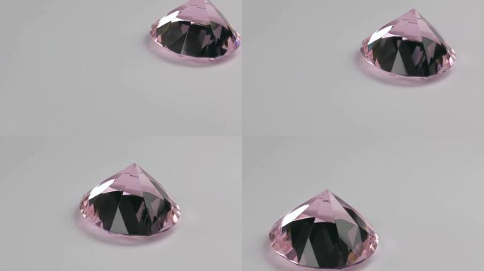 透明粉色水钻的近似值。滑块镜头。钻石