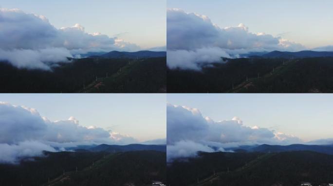 令人印象深刻的视频，阴云密布的锋面笼罩着森林茂密的山顶