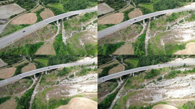 山景中的快速入门之路。穿过山间桥的高速公路。