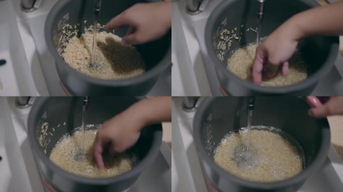 用水清洗大米在家煮饭