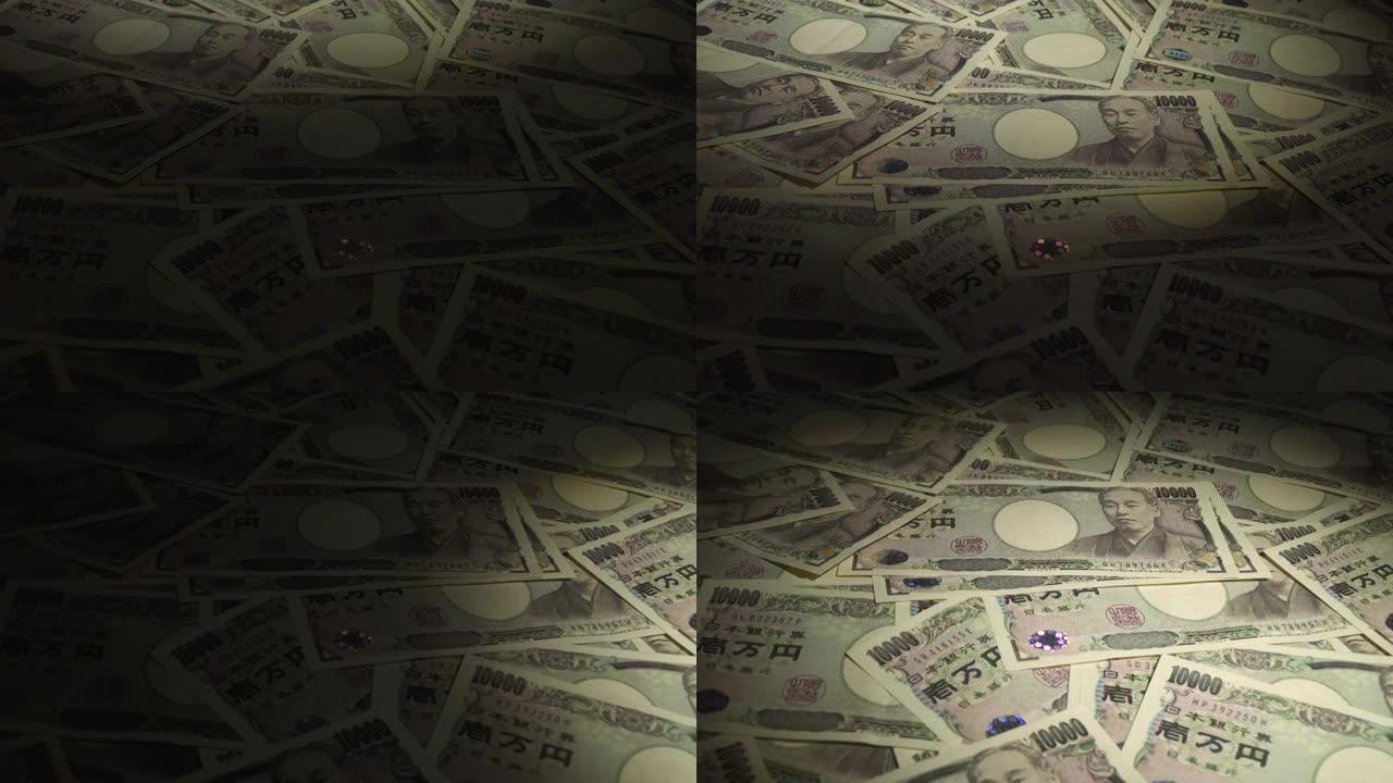 把手电筒照在桌子上的10,000日元钞票上。