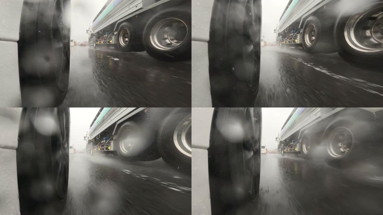 半卡车在大雨中在高速公路上超车
