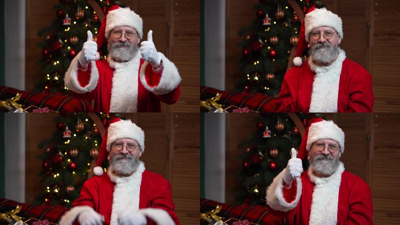 圣诞老人看着相机的肖像，露出竖起大拇指的手势。老人，留着红色西装的胡须，戴着帽子，背景是带有玩具和灯