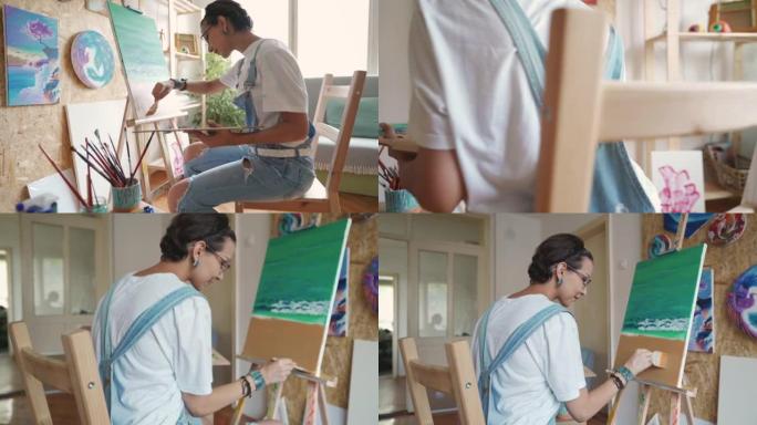 年轻的女艺术家在家里画画布