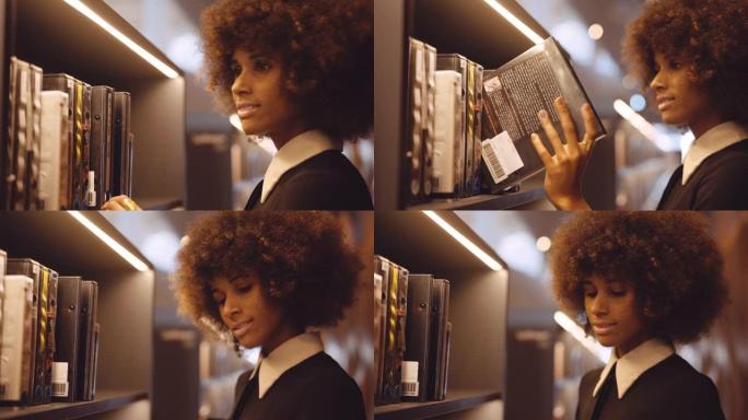 年轻女子从图书馆书架上选书