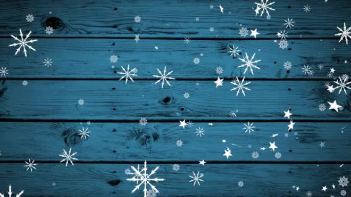 圣诞雪花落在蓝色木质背景上的动画