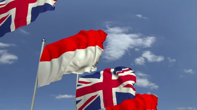 蓝天映衬着印度尼西亚和英国的国旗